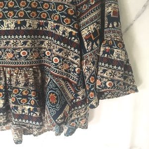 Runway Story Tops - Elephant Print Peplum Blouse Runway Story Tops - Elephant Print Peplum Blouse